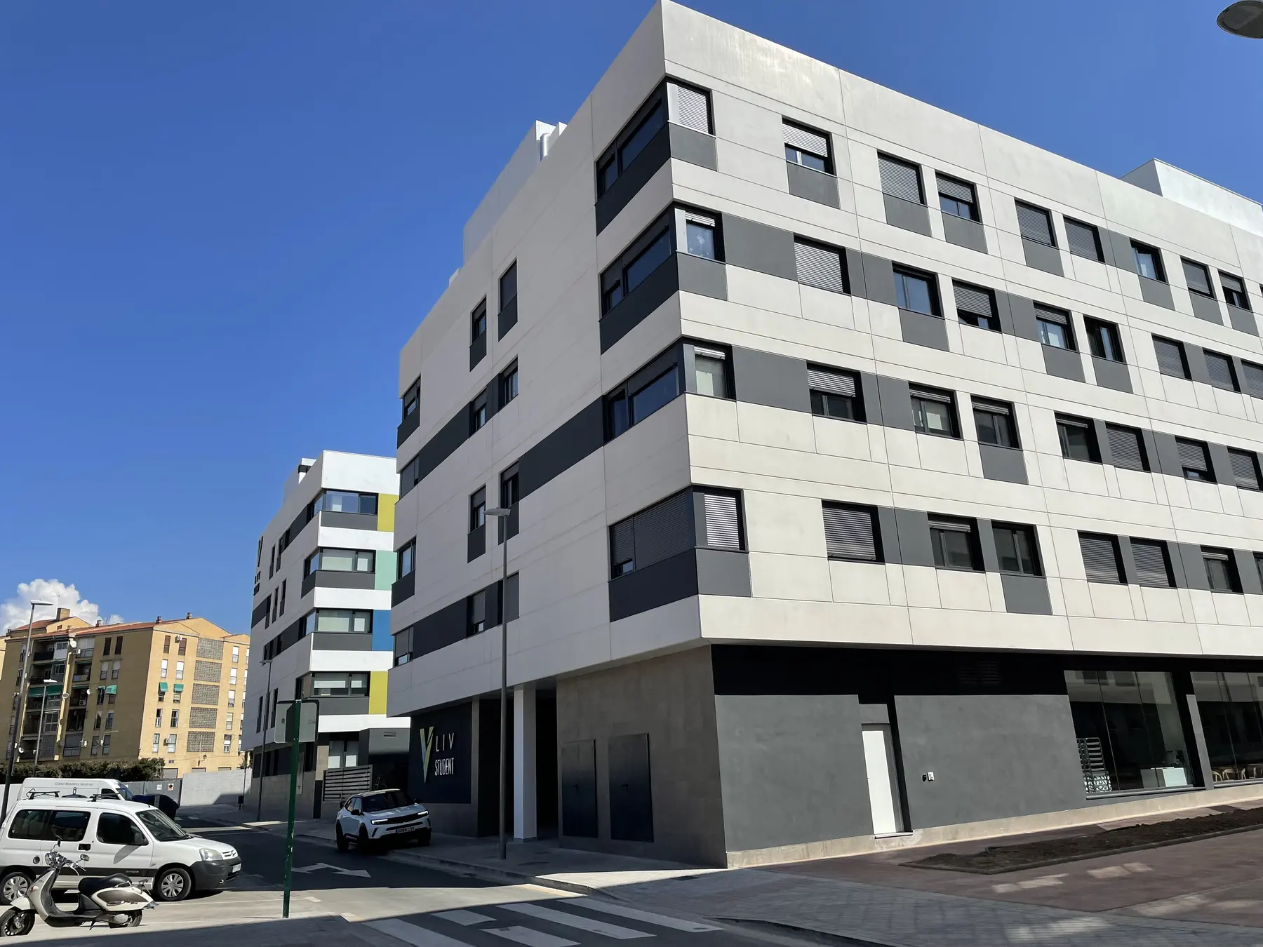 Modern student residence buildings in Granada viewed from the street on a clear day